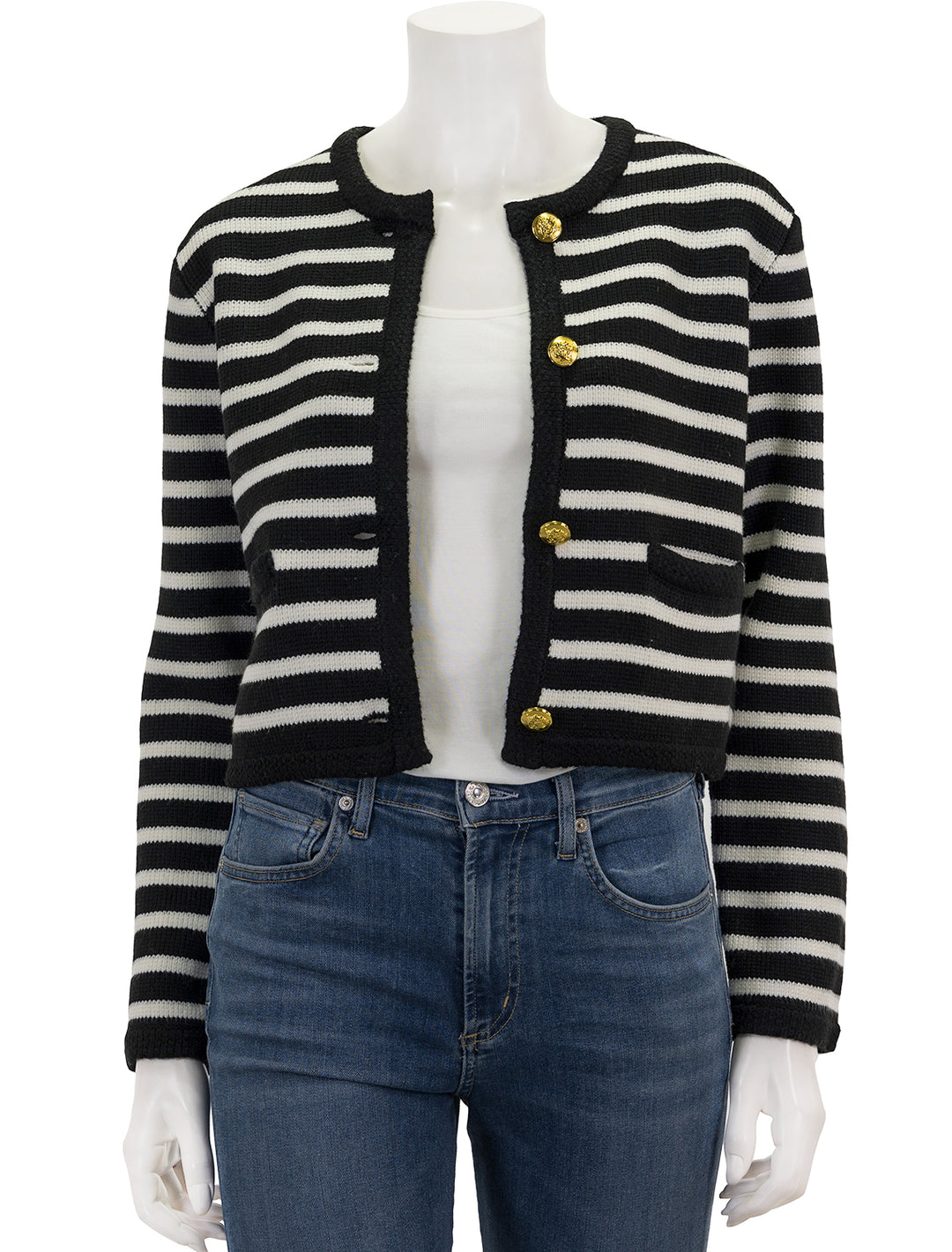 Front view of English Factory's cardigan in black and ivory stripe, unbuttoned.