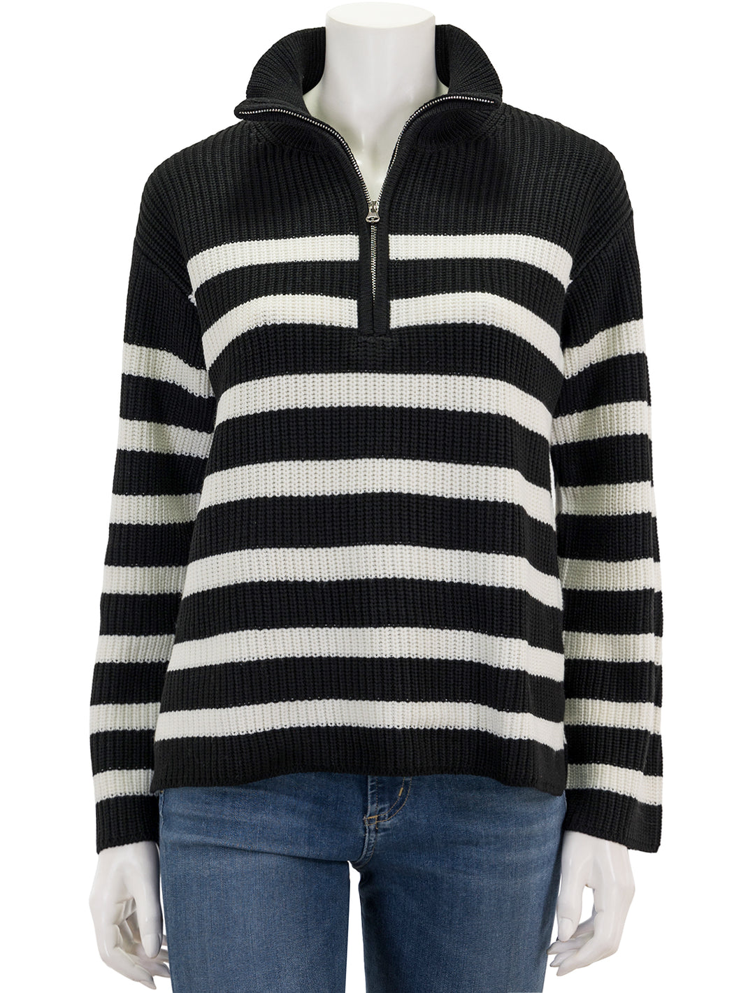 Front view of English Factory's striped half zip sweater in black and white.