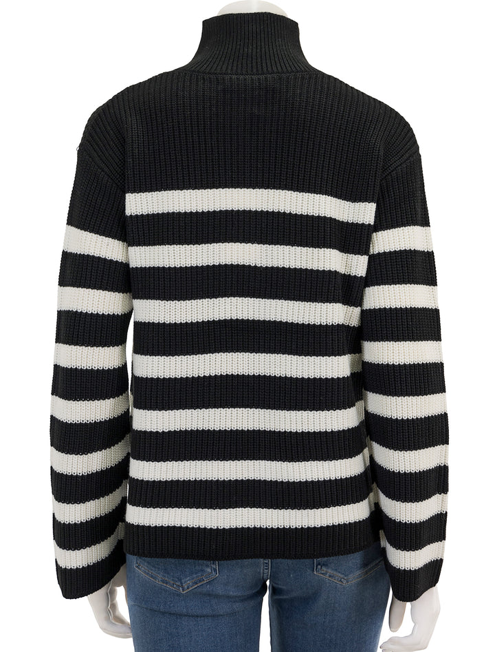 Back view of English Factory's striped half zip sweater in black and white.