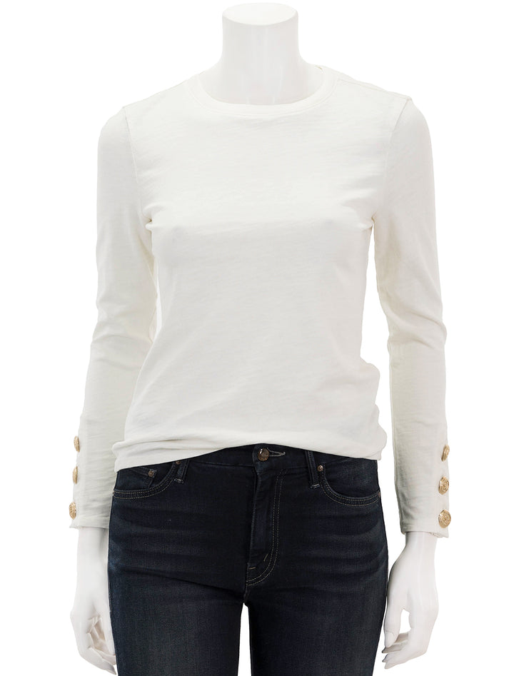 Front view of Nation LTD's kiana crew with button cuff detail in off white.