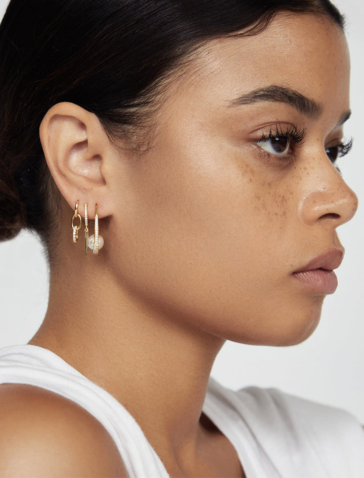 model wearing link pave drop earrings