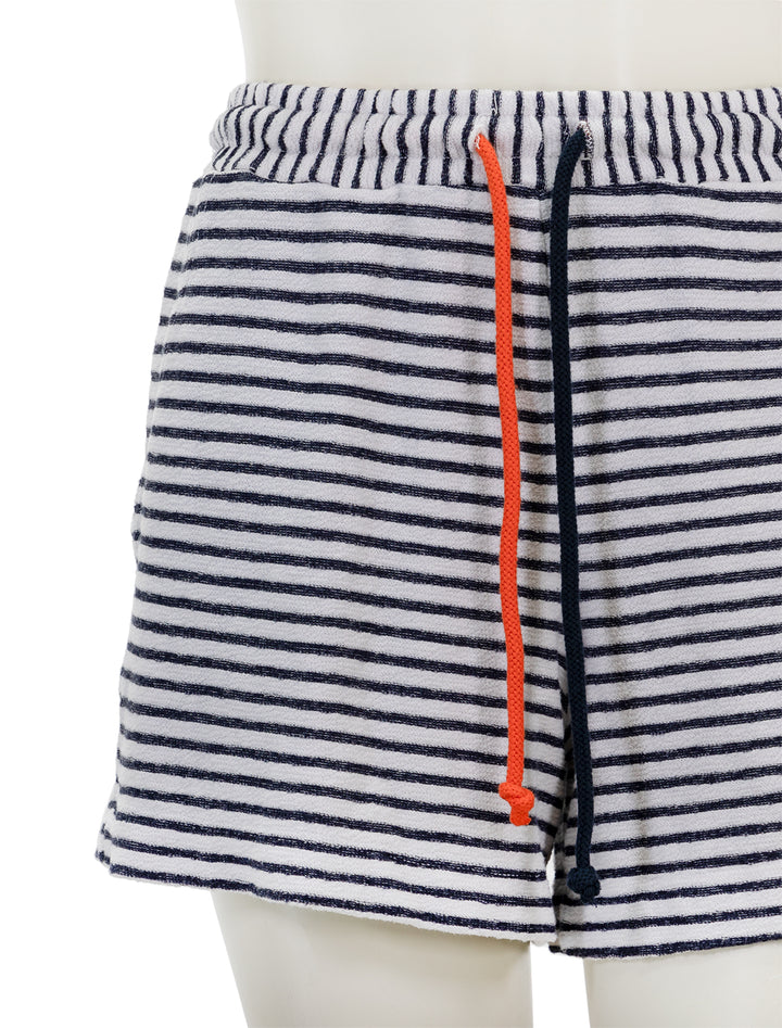 Close-up view of Sundry's stripe pullon shorts in white.