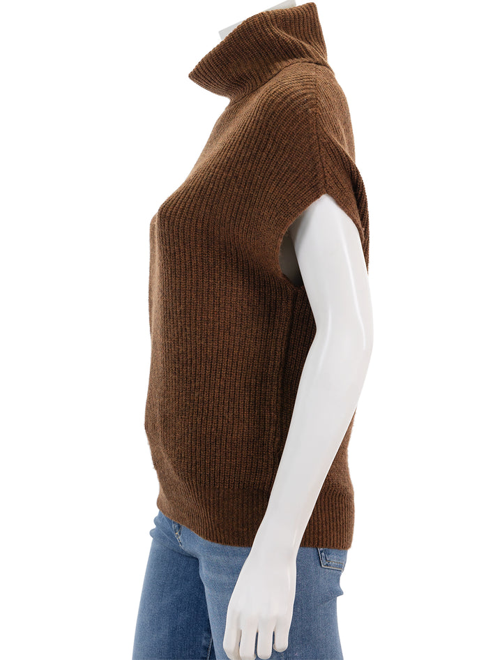 Side view of Lilla P.'s ribbed turtleneck sweater in copper.