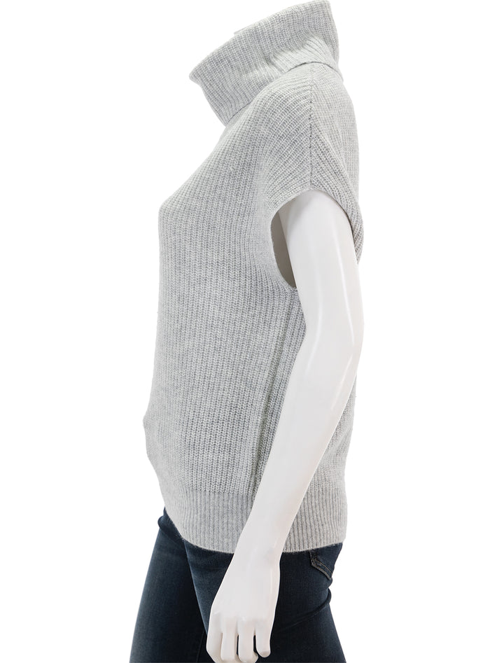 Side view of Lilla P.'s ribbed turtleneck sweater in heather grey.
