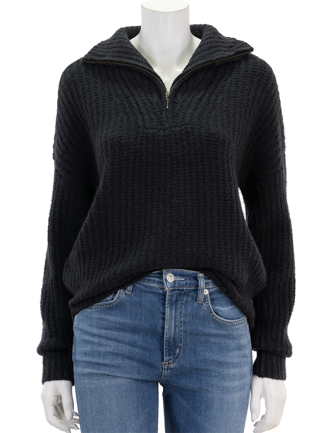 Front view of Lilla P.'s ribbed half zip sweater in black.