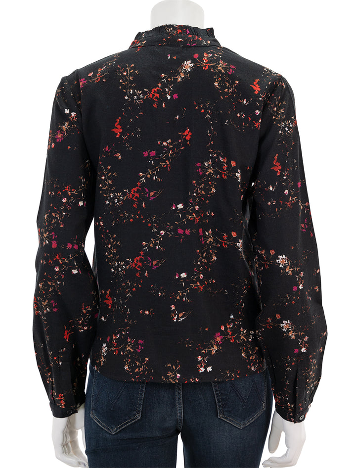 Back view of Lilla P.'s ruffle button down blouse in black floral print.