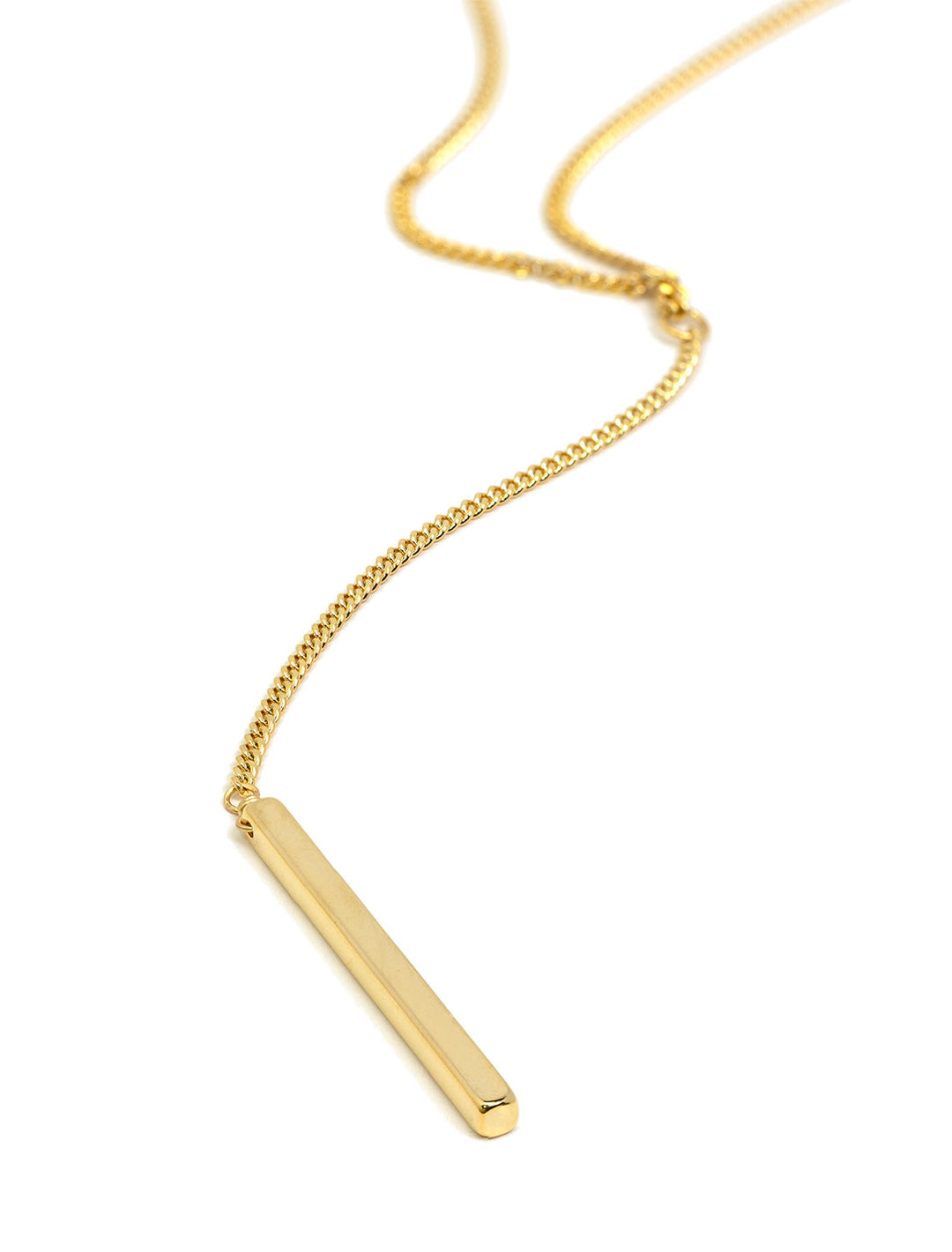 Stylized laydown of AV Max's long y bar chain necklace in gold.