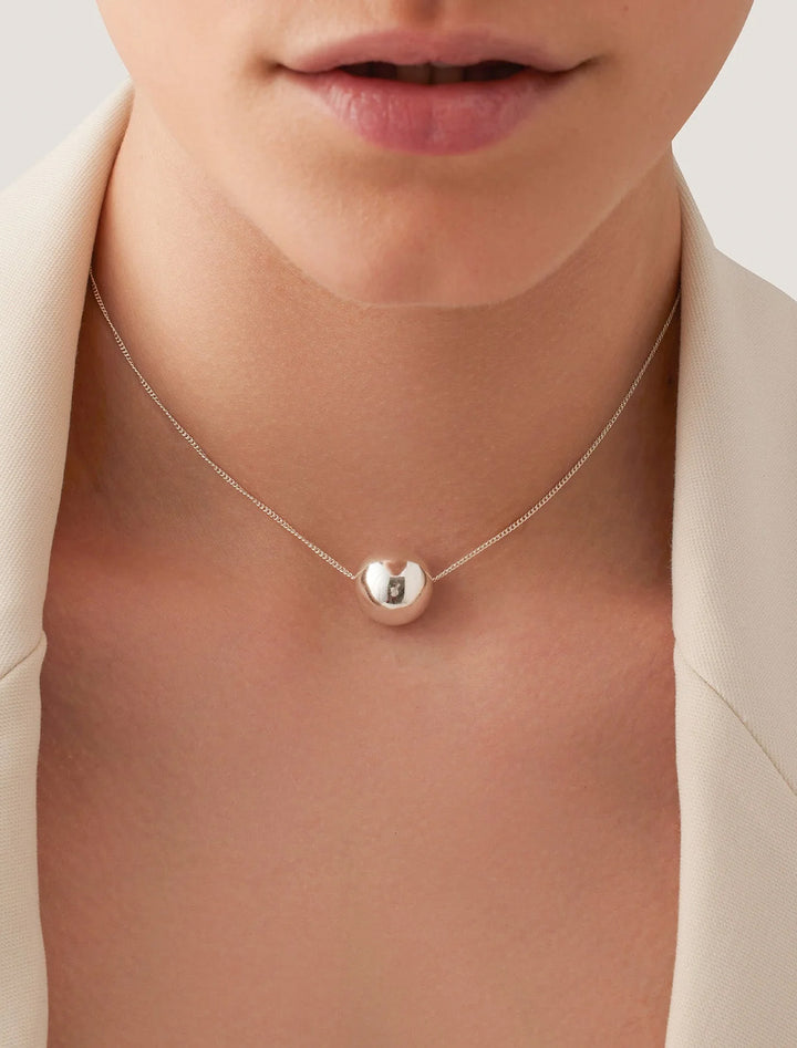 model wearing aurora pendant necklace in silver (2)