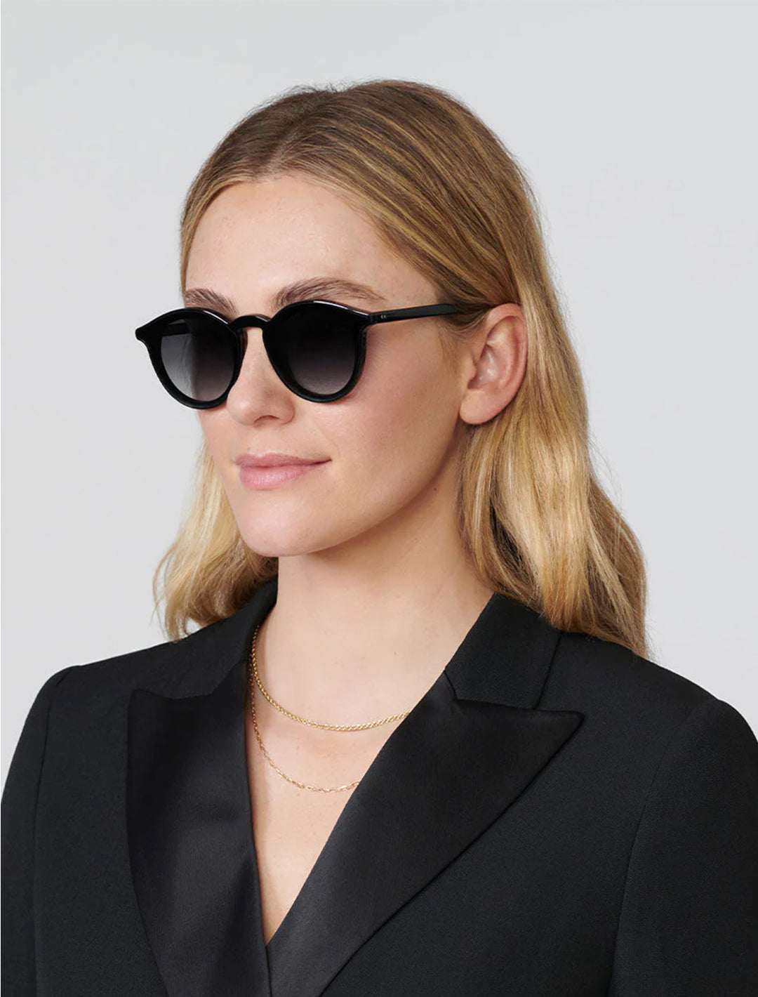 model wearing collins nylon in black + black crystal