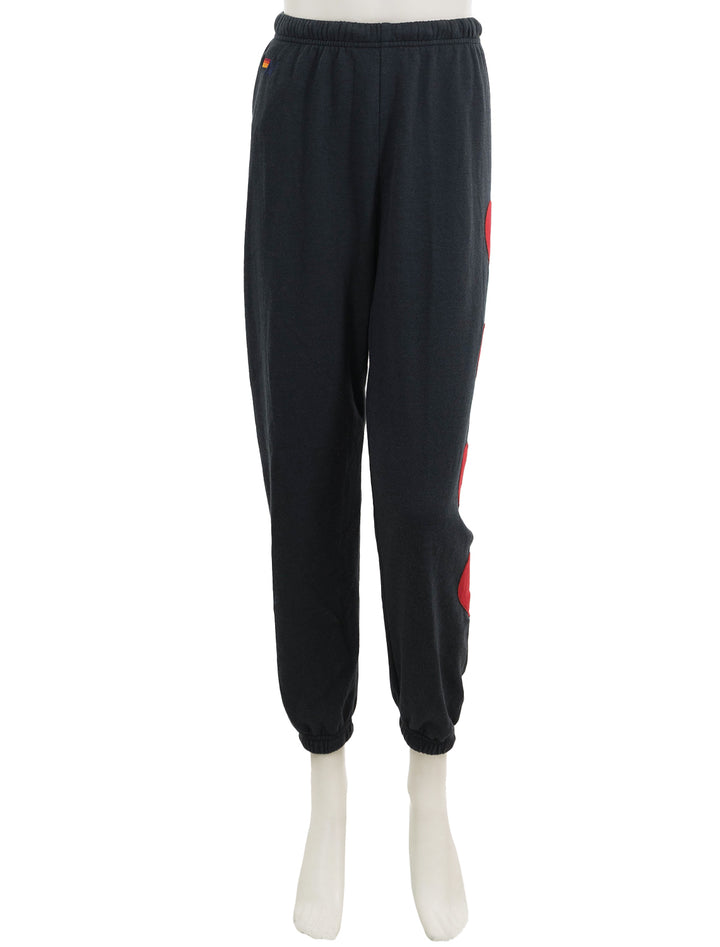 Front view of Aviator Nation's heart stitch 4 sweatpants in charcoal.