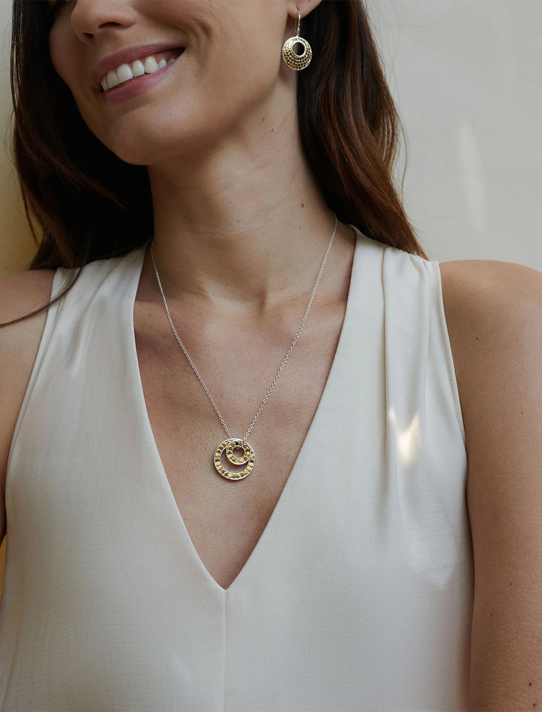 model wearing archive bali double circle necklace in two tone