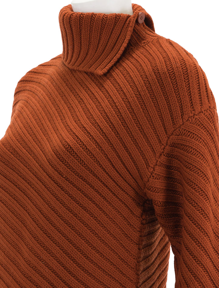 Close-up view of STAUD's engrave sweater in cinnamon.