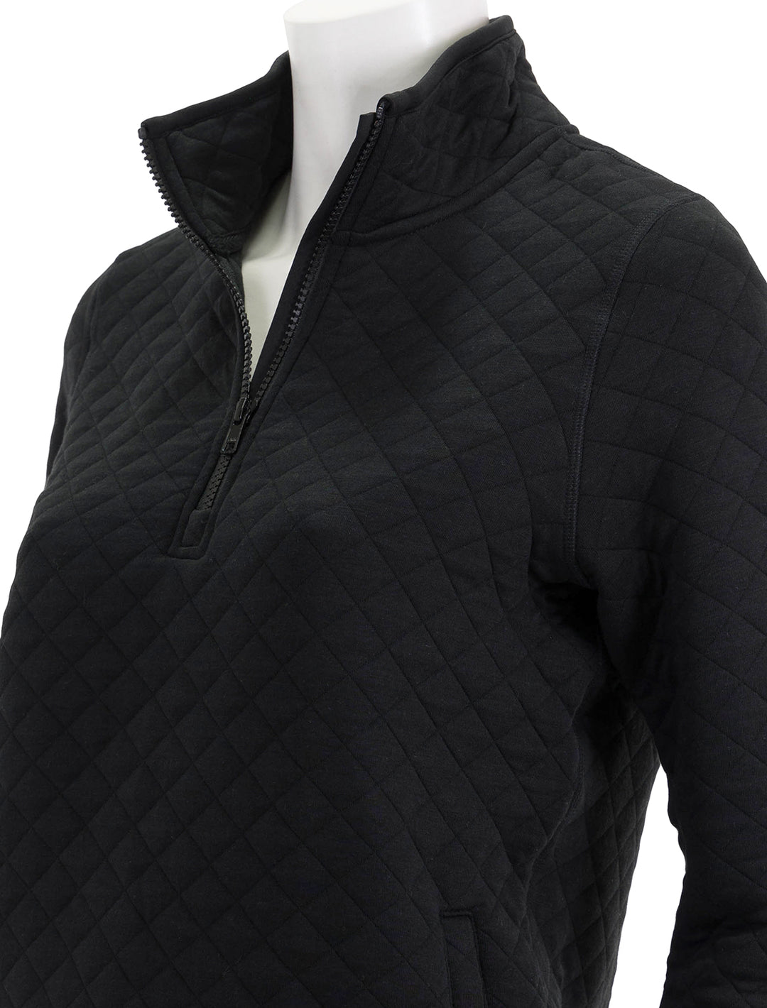 Close-up view of Marine Layer's corbet quilted pullover in black heather.