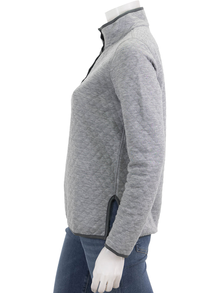 Side view of Marine Layer's reversible corbet pullover in charcoal and heather grey.