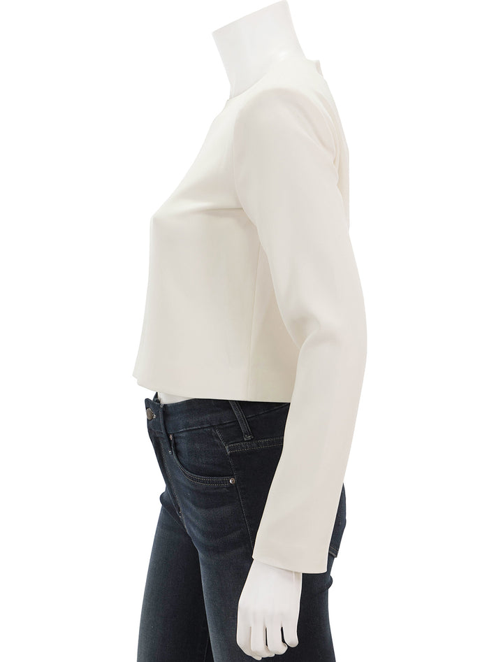 Side view of Theory's long sleeve admiral crepe top in rice.