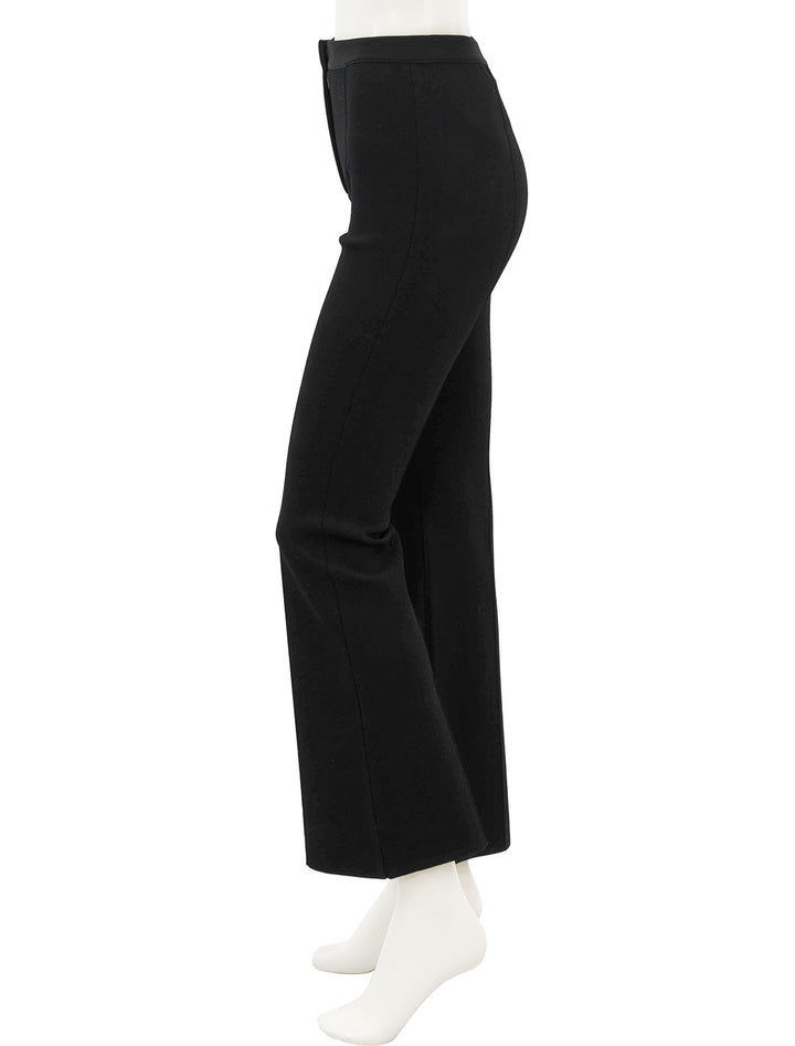 Side view of heory's flare pant in black compact crepe.