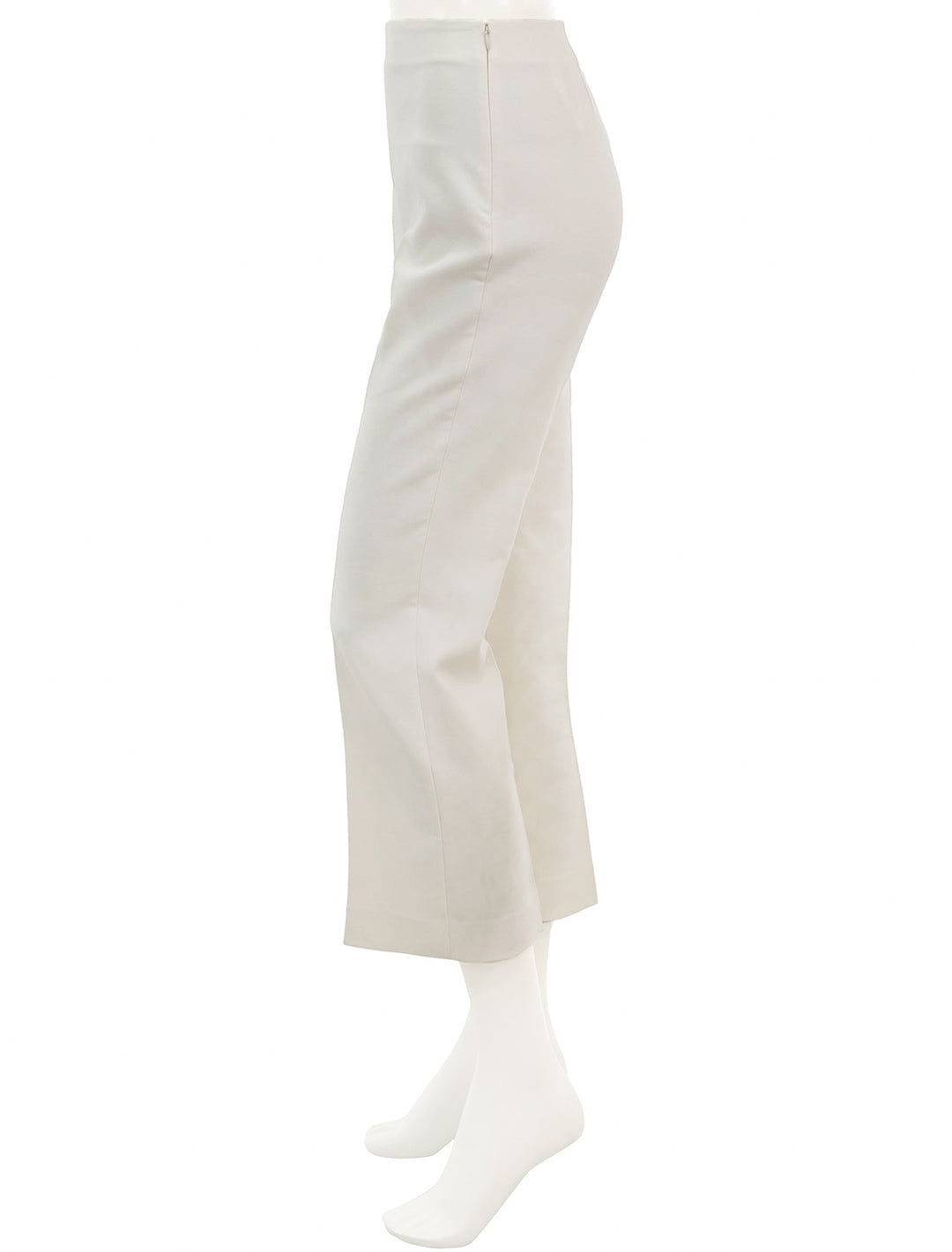 Side view of Theory's tailored kick pant in ivory.