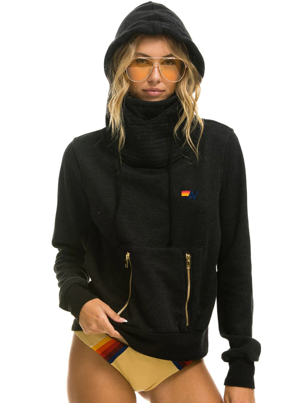Model wearing Aviator Nation's ninja pullover in black.