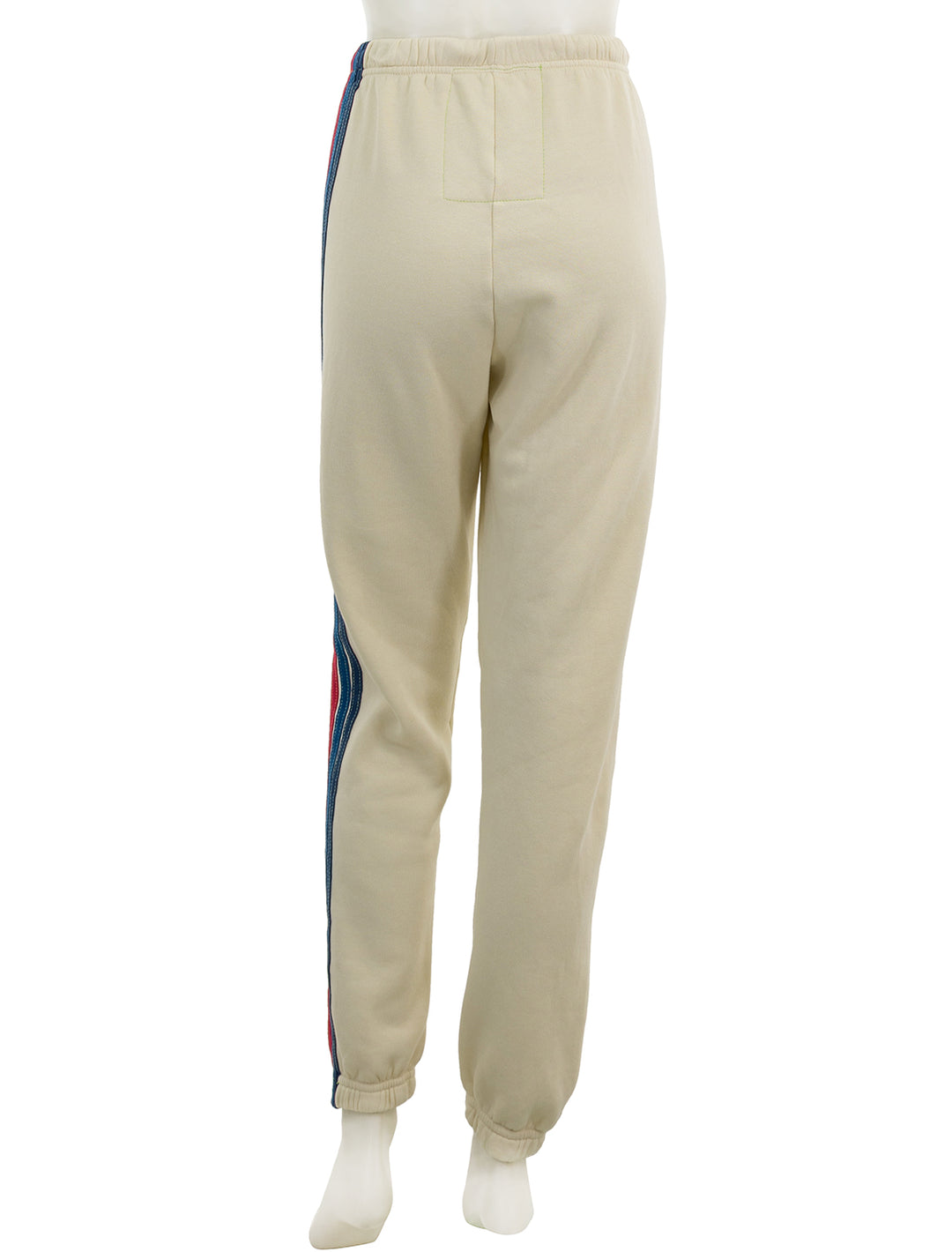 Back view of Aviator Nation's 5 stripe womens sweatpants in vintage white.