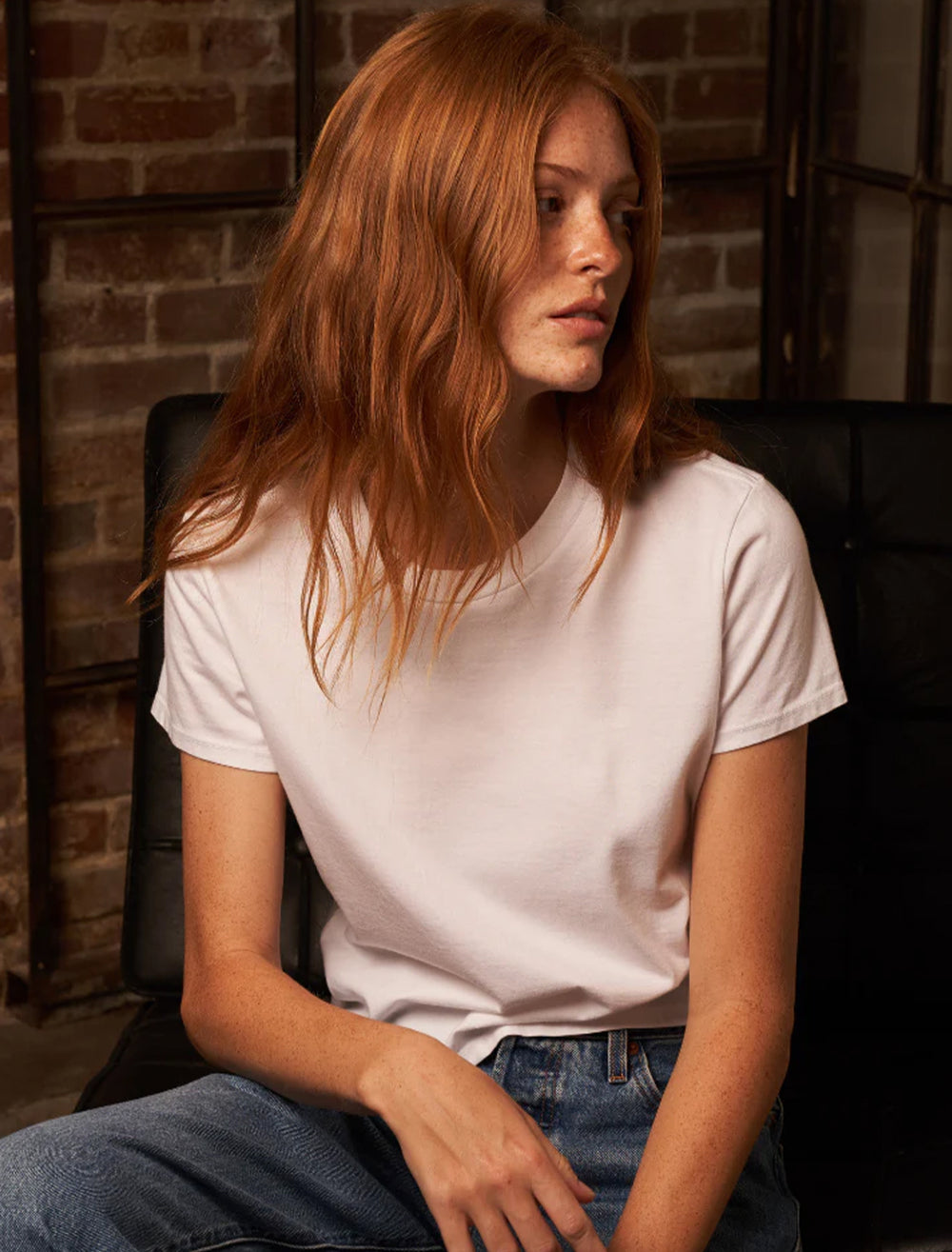 Model wearing Perfectwhitetee's springsteen tee in white.
