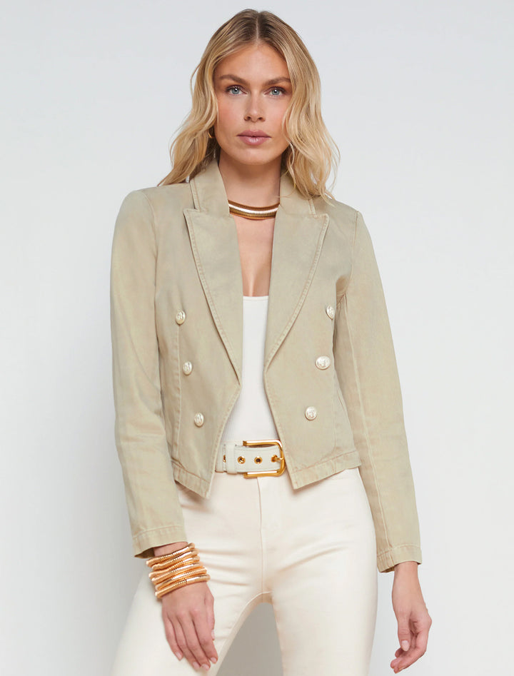 Model wearing L'agence's wayne crop jacket in sand dune.
