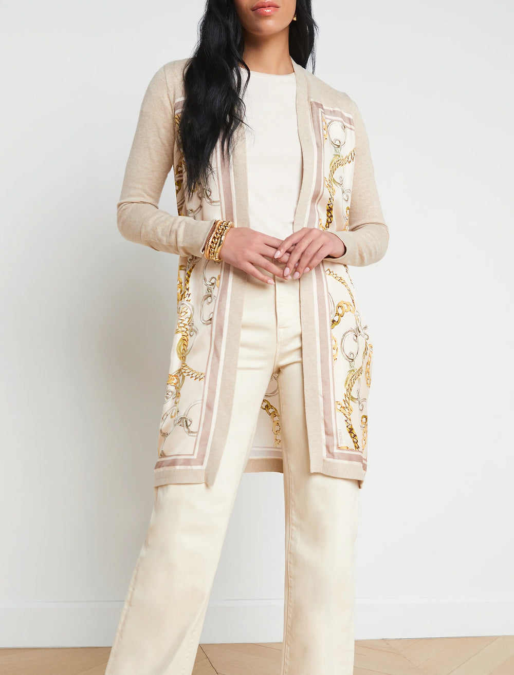 Model wearing L'agence's beverly silk panel cardi in crema.