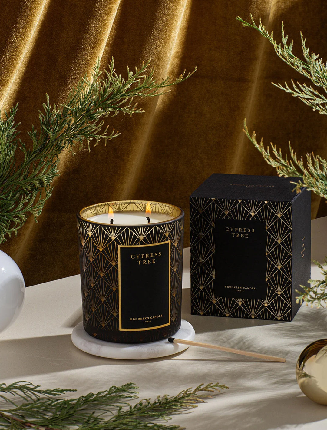 Brooklyn Candle Studio's cypress tree black tie holiday candle.