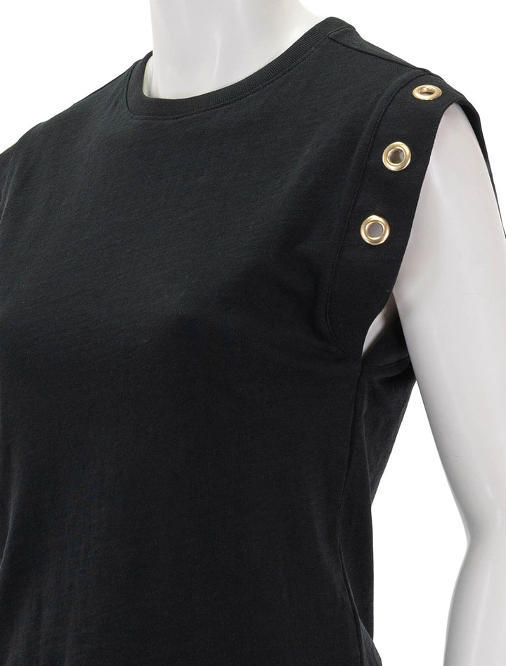 close up view of oran muscle tee with grommets in black