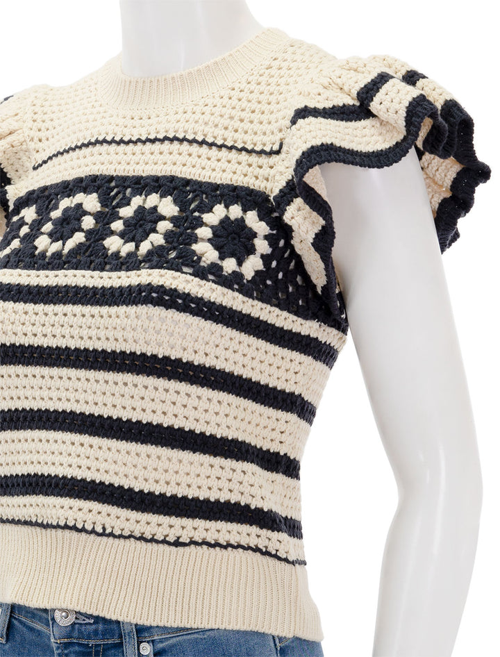 Close-up view of Rails' penelope sweater in oat and navy crochet.