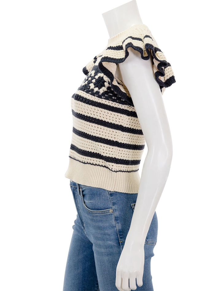 Side view of Rails' penelope sweater in oat and navy crochet.