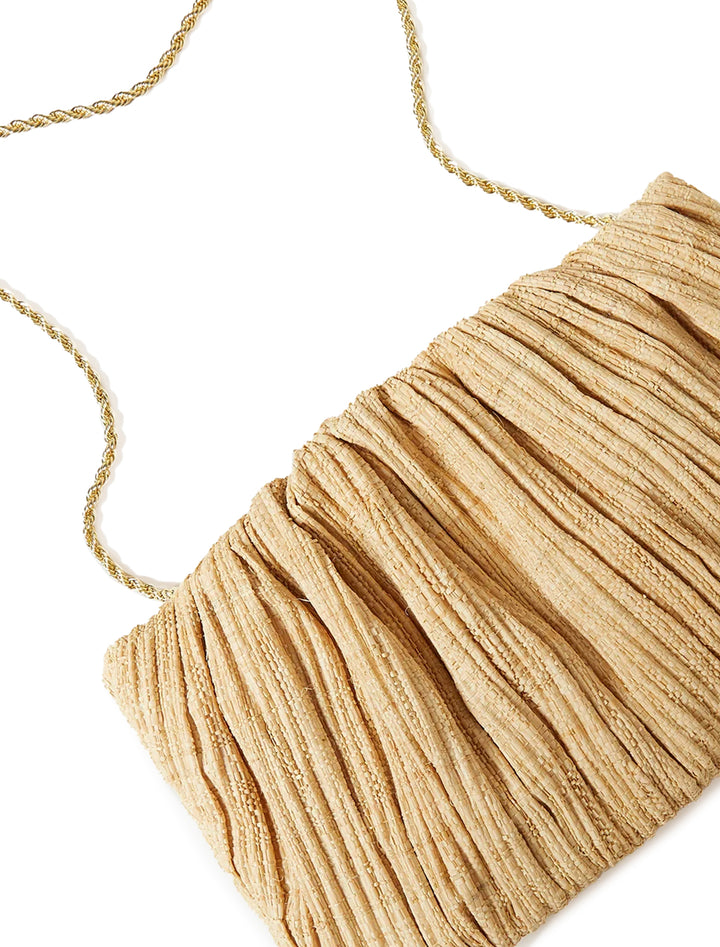 Close-up view of Loeffler Randall's brit flat pleated pouch in natural.