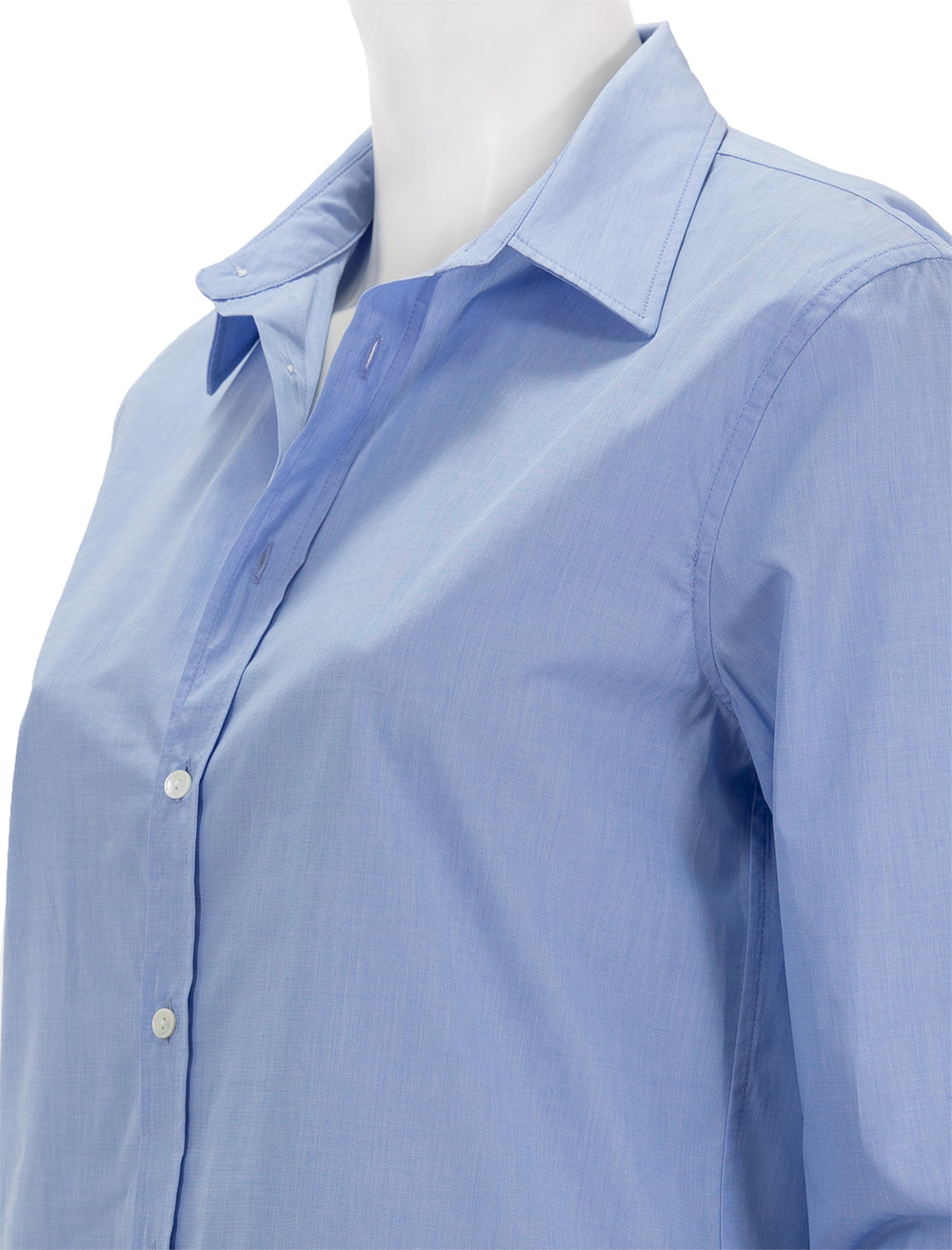 Close-up view of Nili Lotan's raphael classic shirt in light blue.