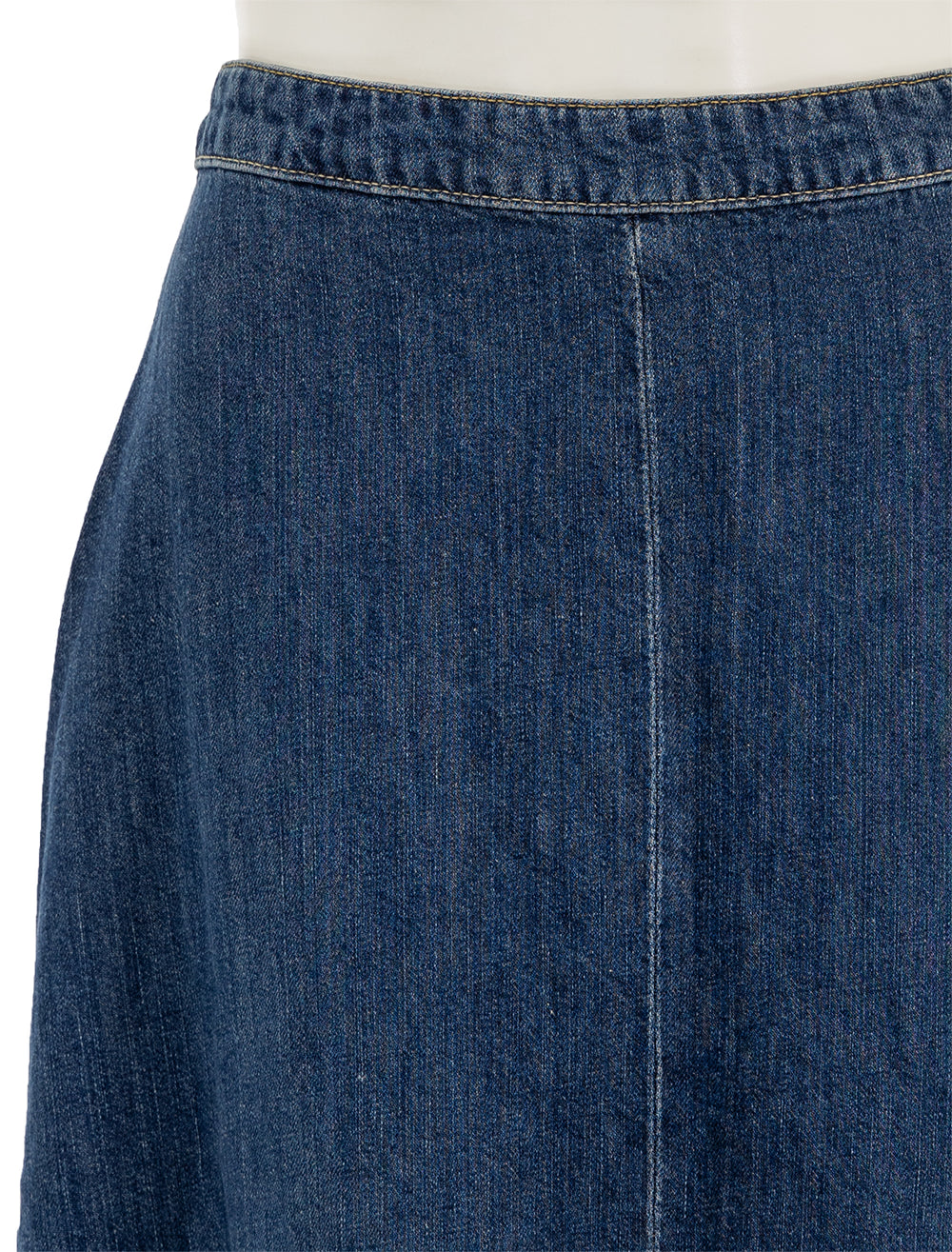 Close-up view of Nili Lotan's astrid denim skirt in classic wash.