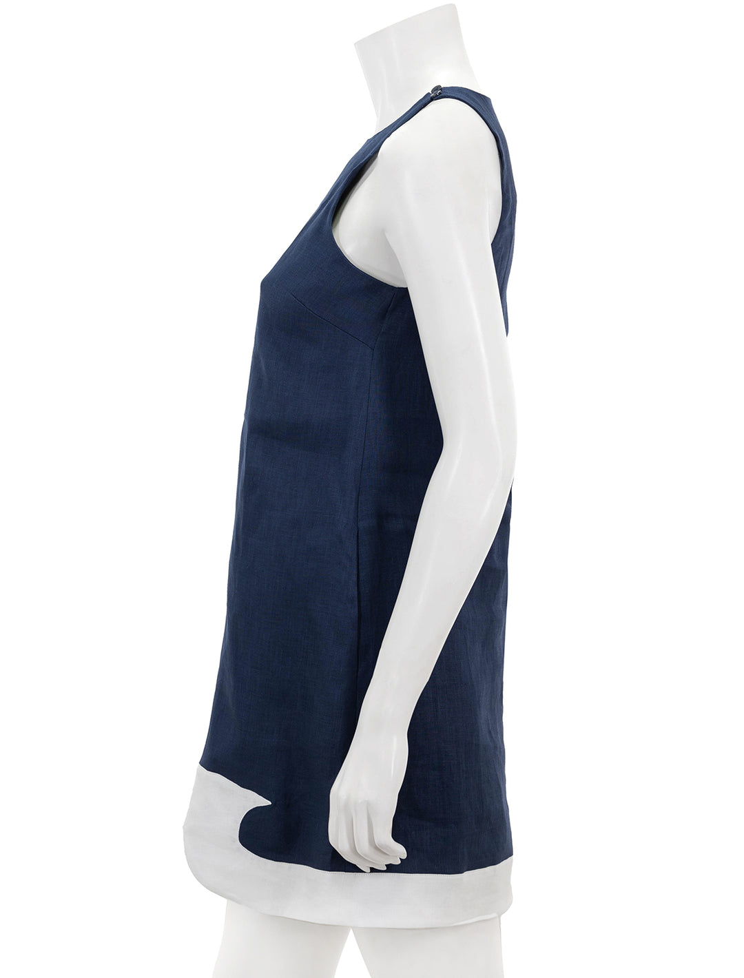Side view of STAUD's allori dress in navy and white.