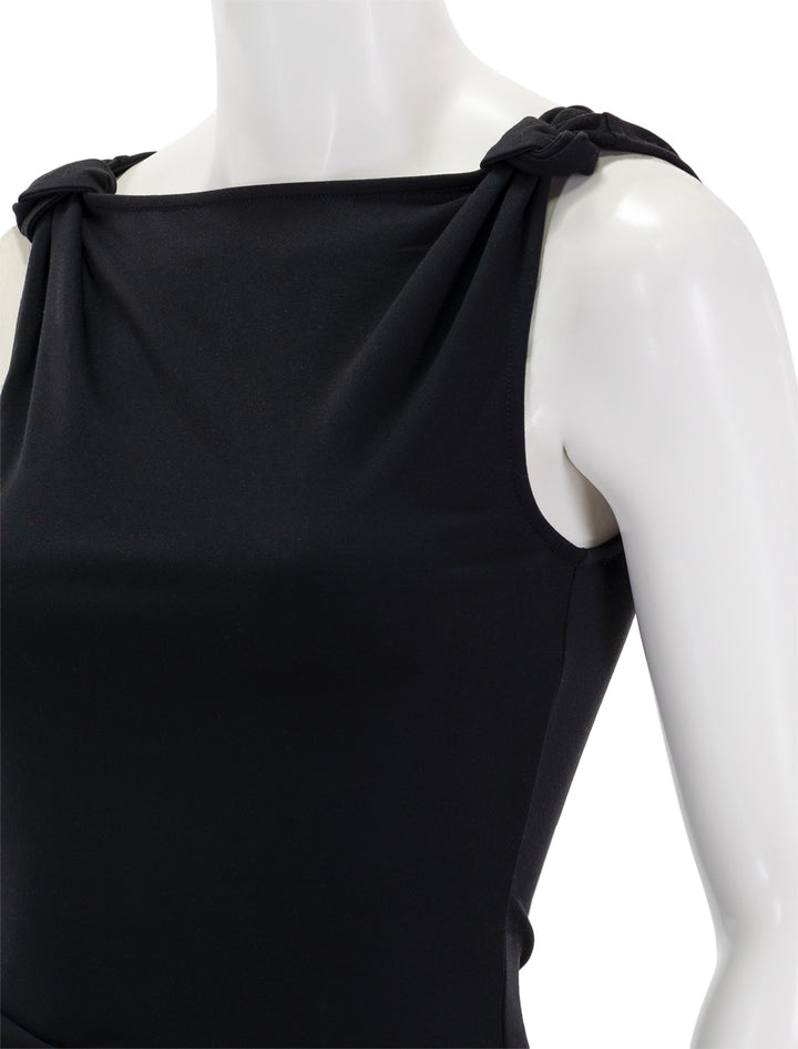 Close-up view of STAUD's kyal dress in black.