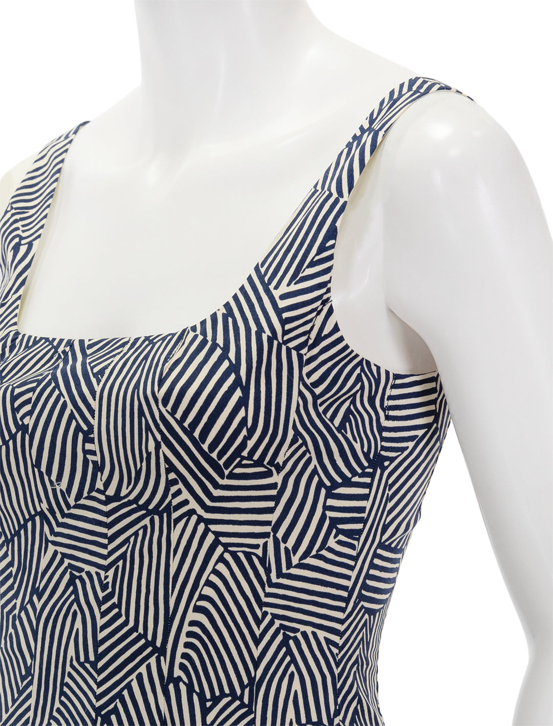 Close-up view of STAUD's wells dress in navy mosaic.