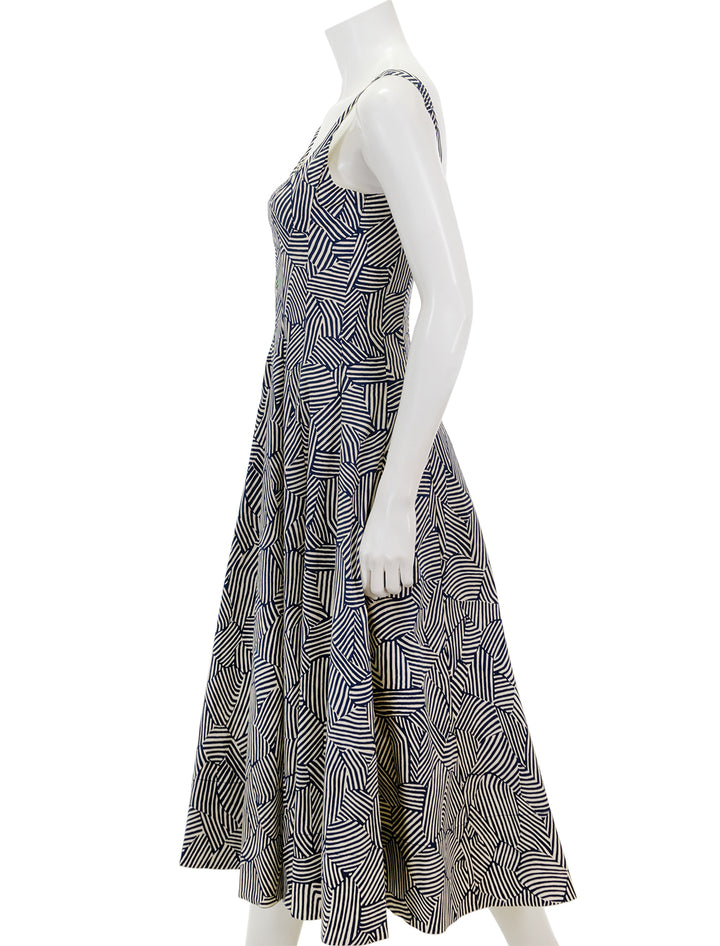 Side view of STAUD's wells dress in navy mosaic.