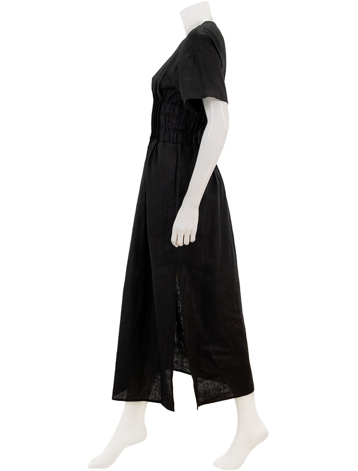 Side view of Staud's lauretta dress in black.