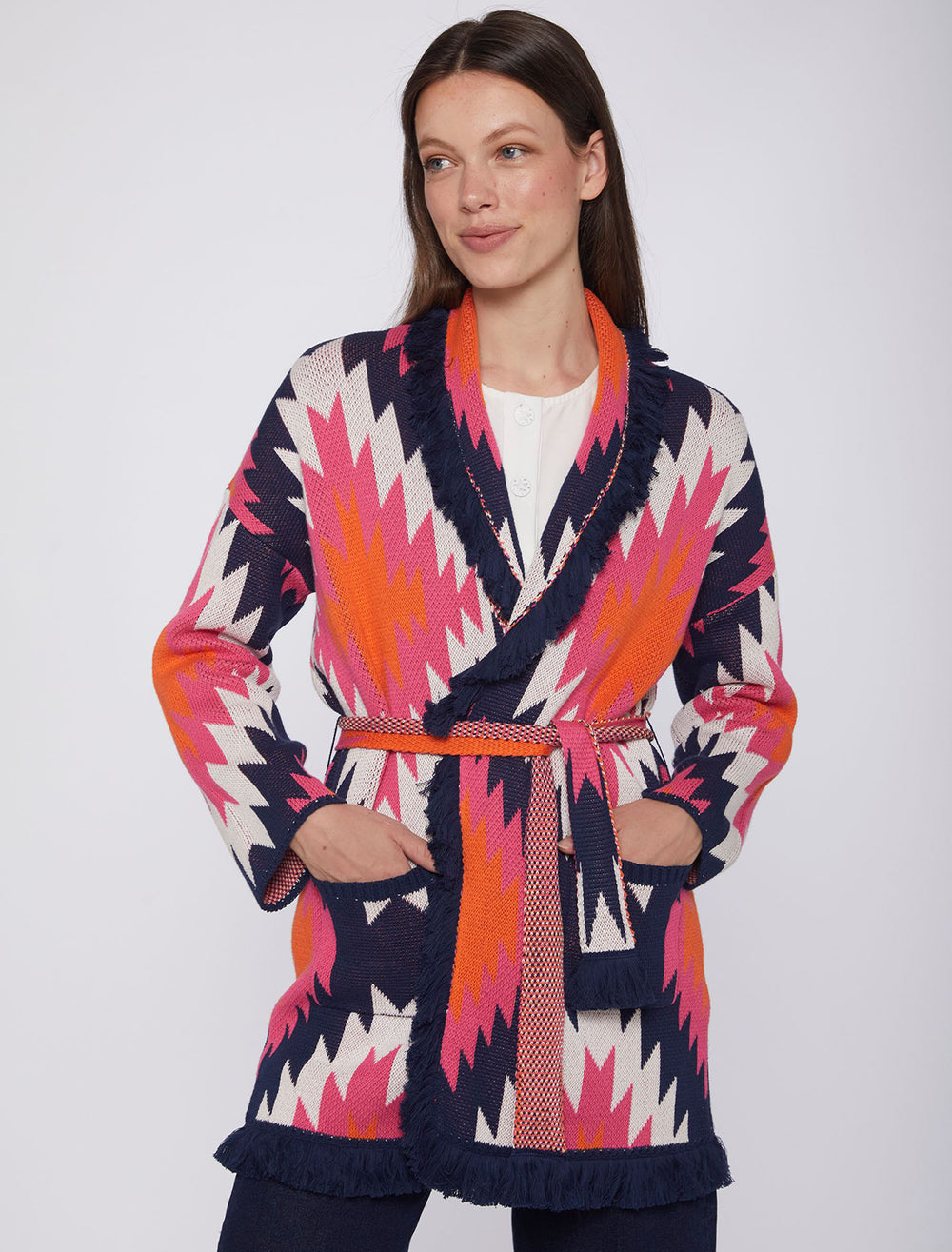 Model wearing Vilagallo's Wrap Cardigan in Pink and Navy Multi.