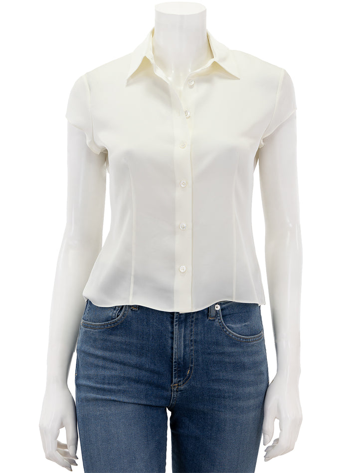 Front view of Theory's cap sleeve blouse in ivory.
