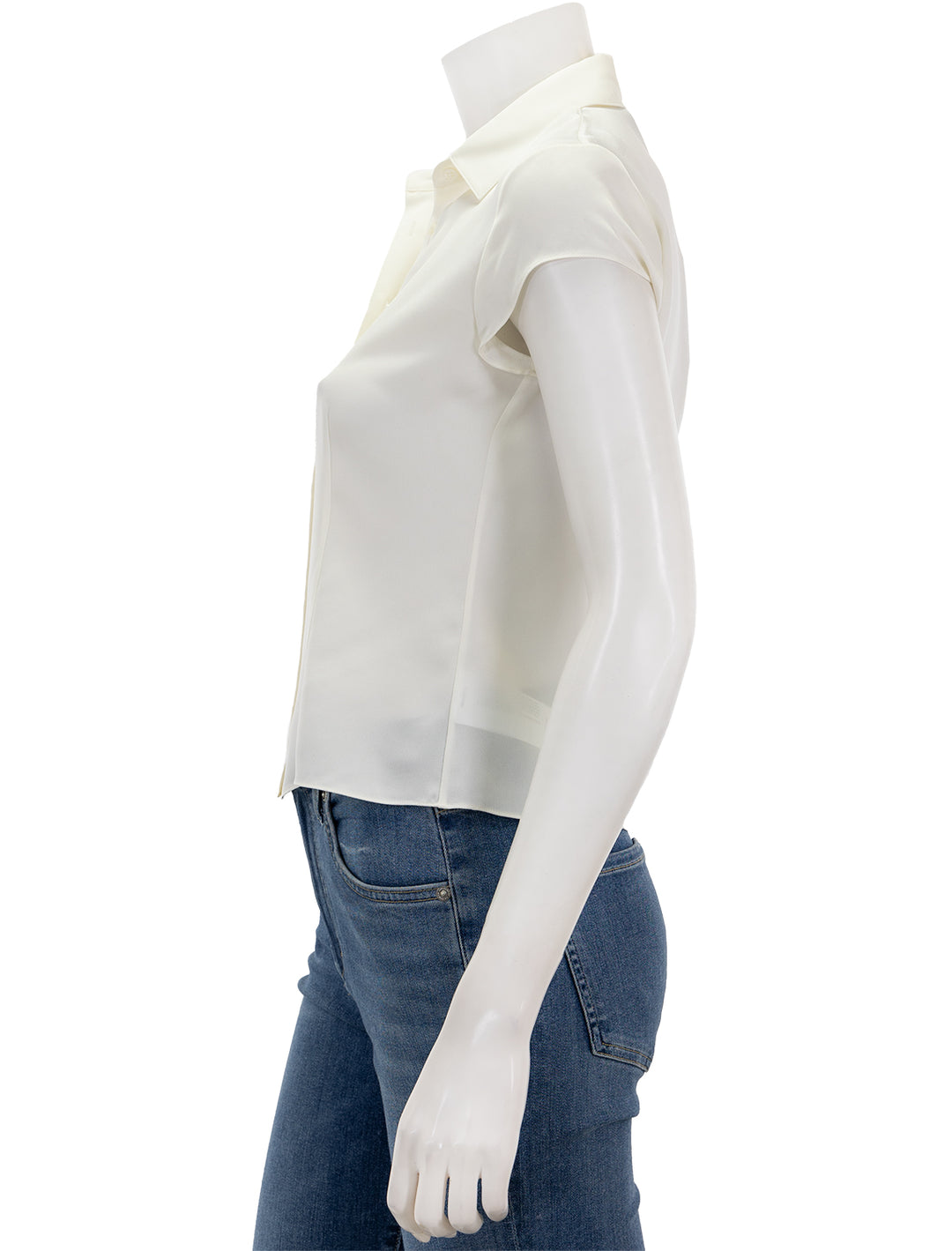 Side view of Theory's cap sleeve blouse in ivory.