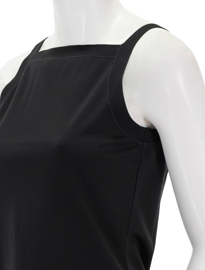Close-up view of Theory's square high neck tank in black.