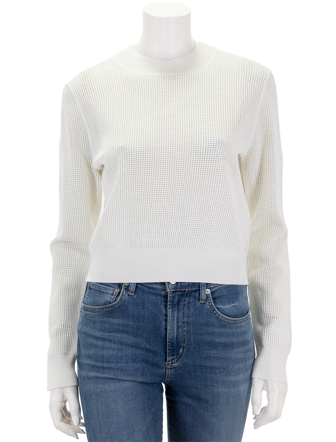 Front view of Theory's pointelle pullover in white.