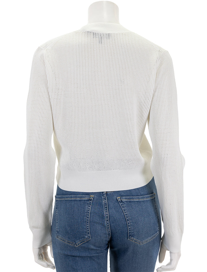 Back view of Theory's pointelle pullover in white.