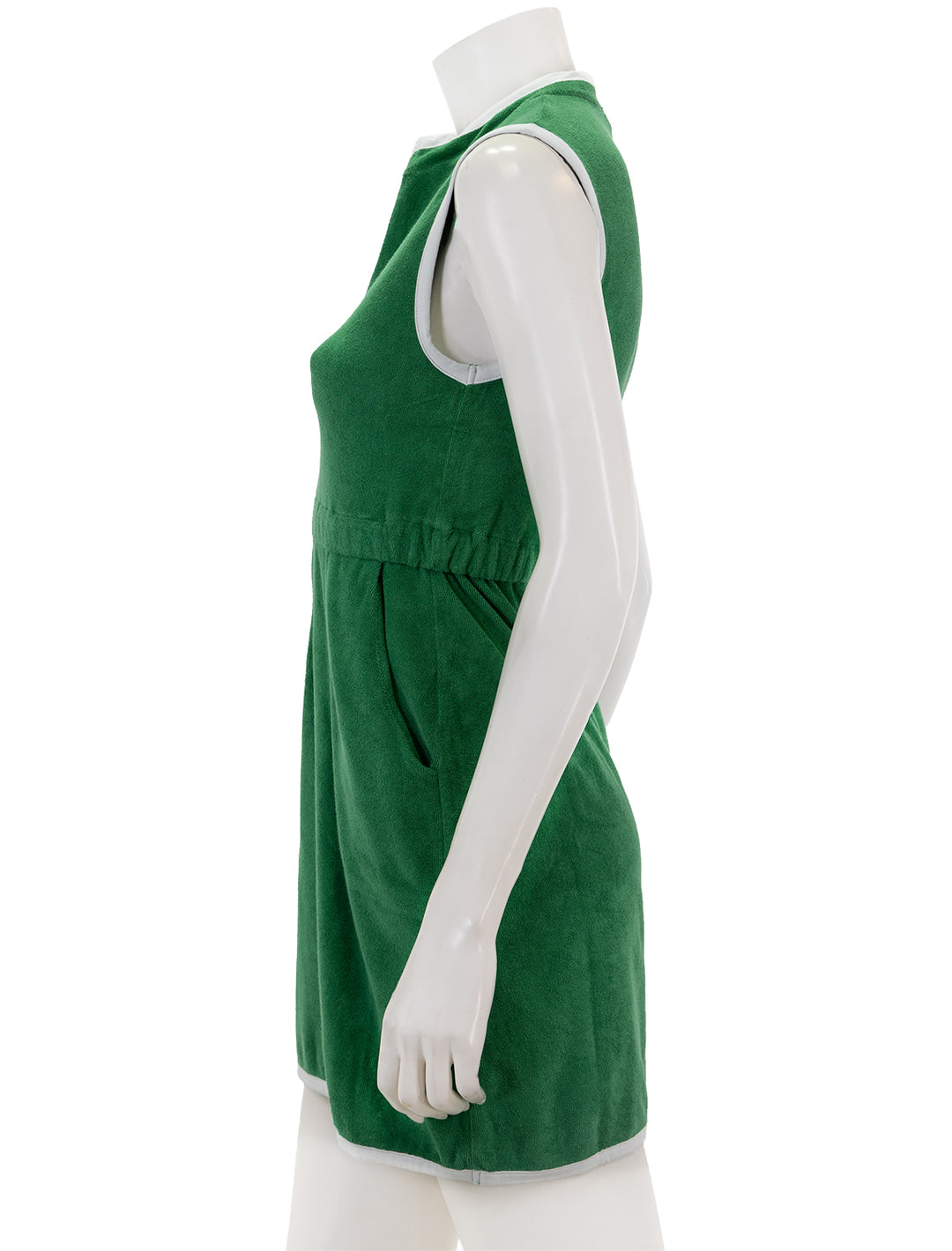 Side view of KULE's the terry dress in green.