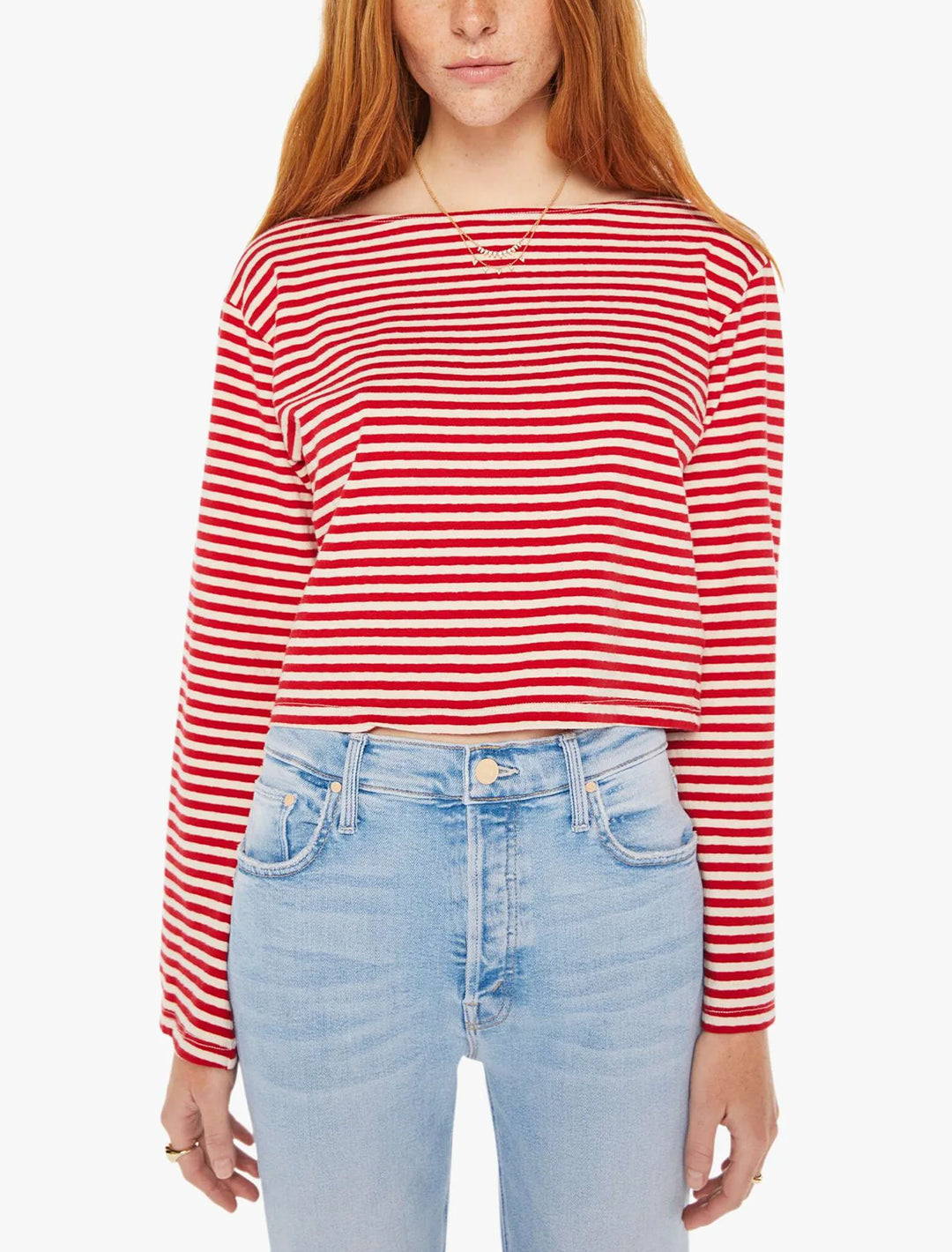 Model wearing Mother Denim's the skipper bell tee in red and natural stripe.
