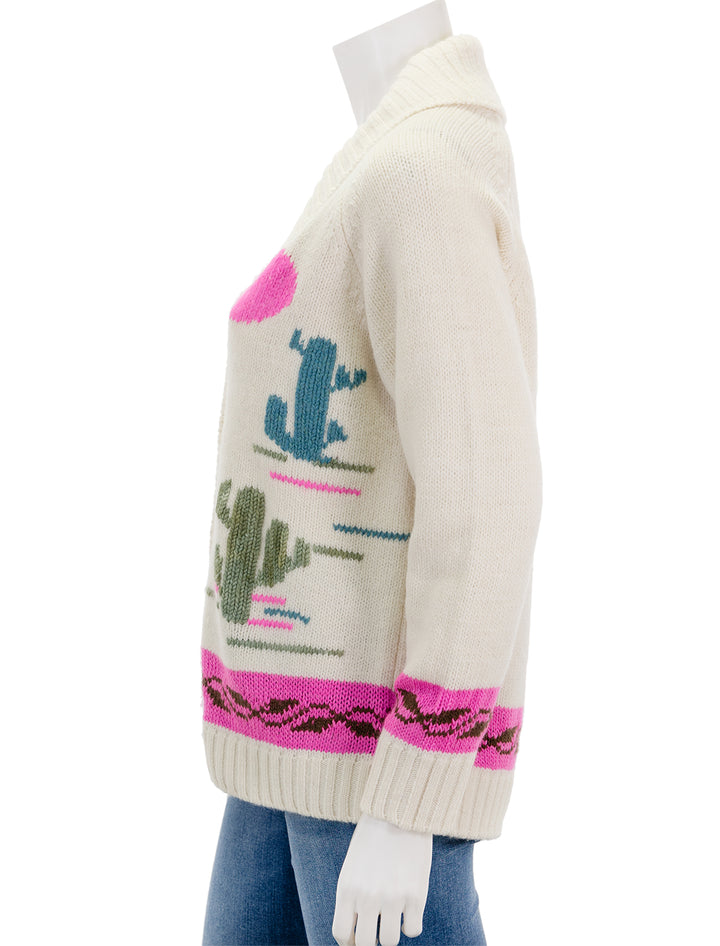 Side view of Sea NY's annette intarsia long sleeve cardigan.