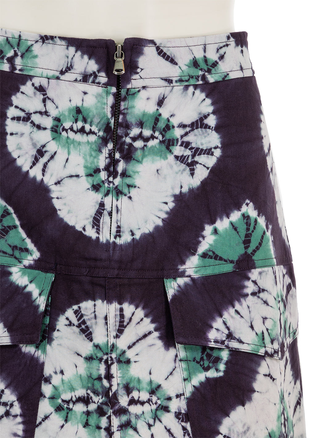 Close-up view of Sea NY's aveline tie dye print skirt in teal.