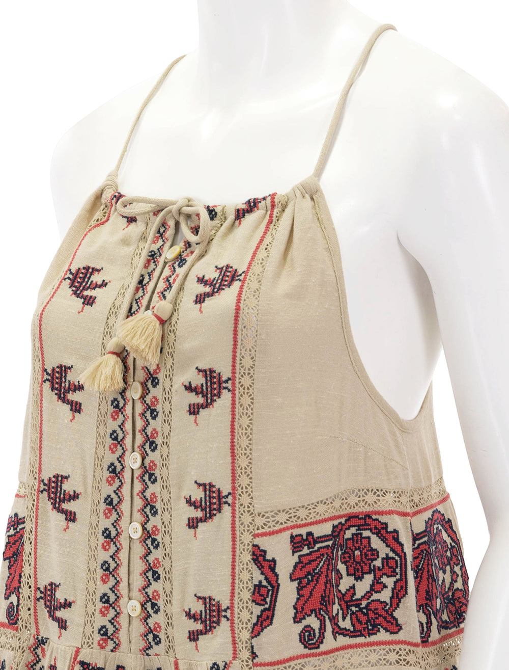 close up view of beena embroidery halter neck dress in taupe