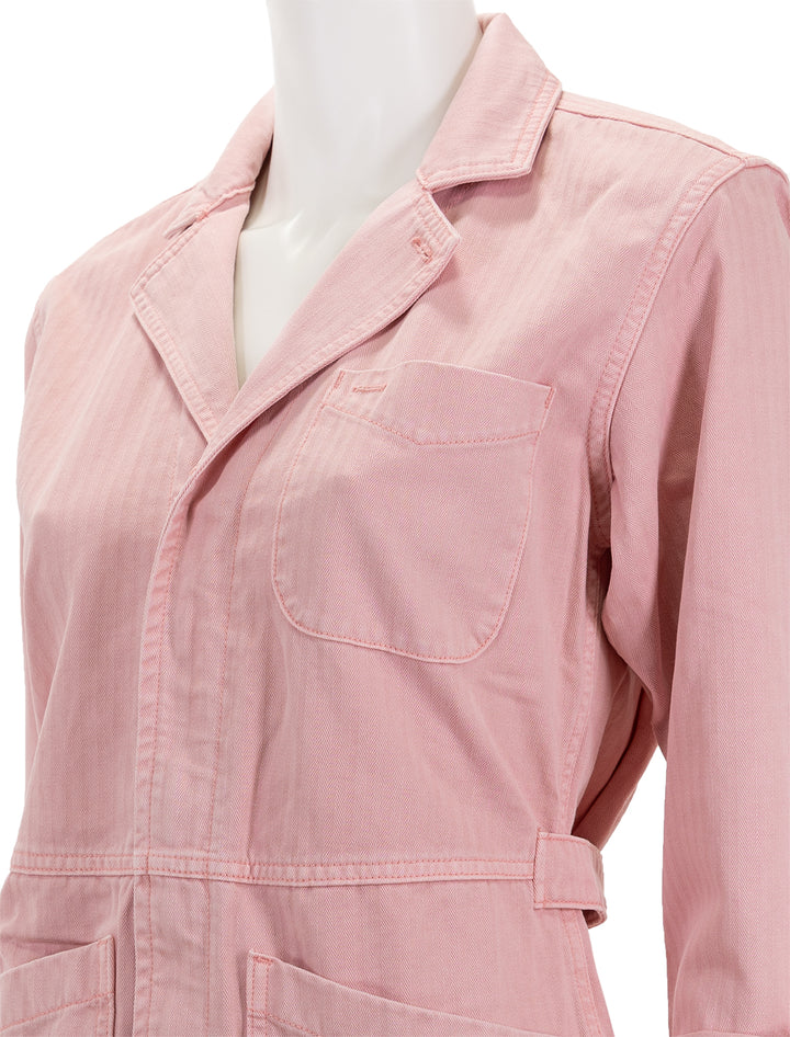 Close-up view of Alex Mill's standard jumpsuit in herringbone blush pink.